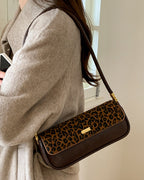 Bianca •  Bolso baguette con estampado animal