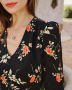 Emilia •  Blusa floral elegante de manga larga